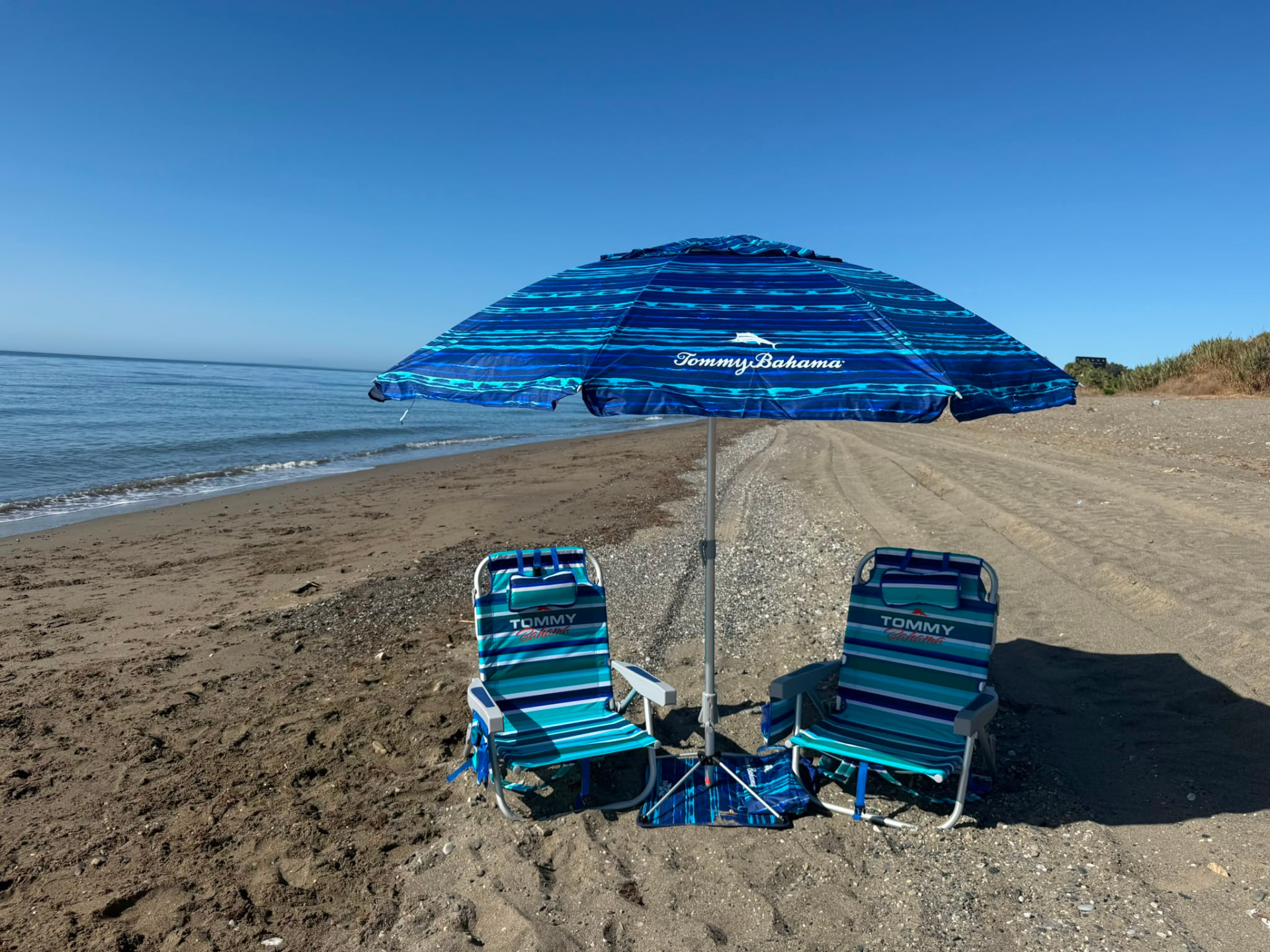 CostaSol Beach & Baby loungers and parasol by the sea